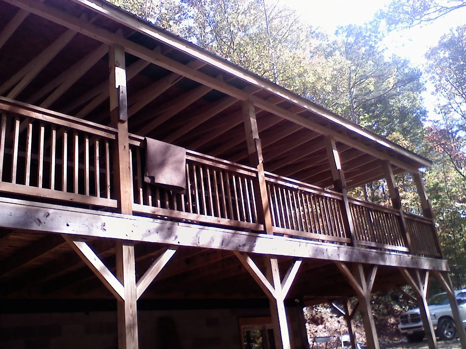Timber framing under a new elevated porch and deck — Roof Leak Repair in Prairieburg by Roofing Brothers